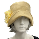 Yellow Gold Eleanor Linen Cloche Hat with narrow brim and flower with rhinestone brooch front view