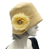 Yellow Gold Eleanor Linen Cloche Hat with narrow brim and flower with rhinestone brooch flower side view