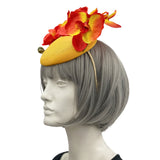 side view of Yellow Fascinator with Red and Orange Orchid Flowers for the  Kentucky Derby and Special Occasions