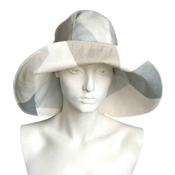Womens wide brim derby hat in neutral and blue patchwork linen