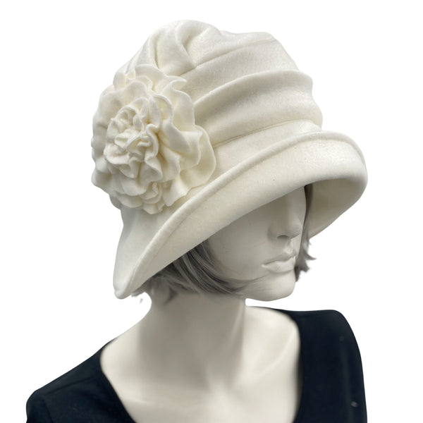 Boston Millinery's handmade winter white cream fleece 1920s style cloche hat for women, shown here on a hat mannequin 