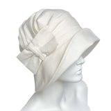 1920s Style cloche hat handmade in off white linen with linen bow brooch side view  Boston Millinery handmade 