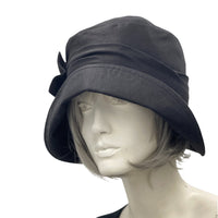 1920s Style cloche hat handmade in black linen with linen bow brooch side front view  Boston Millinery handmade 