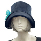 1920s Cloche Hat, Winter Hat Women, Black Velvet Hat with Turquoise and Rhinestone Peony Flower Brooch, Handmade in USA. Front view modeled on a hat mannequin head . front view modeled on a mannequin head 