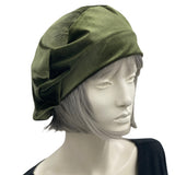 Sage green velvet beret shown modeled on a hat mannequin side view handmade by Boston Millinery 