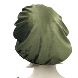 Sage green velvet beret shown modeled on a hat mannequin rear view handmade by Boston Millinery 