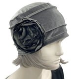 Velvet Cloche Hat and Chemo Headwear in Gray with Satin Flower Embellishment modeled on a hat mannequin side view with flower