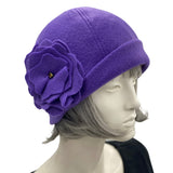 1930s Cloche Hat for Women modeled on a hat mannequin. Handmade in warm Fleece Hat. Purple with Large Flower Brooch, Satin Lined Winter Hat, Handmade in USA Boston Millinery. Side flower view 