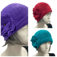 1930s Cloche Hat for Women modeled on a hat mannequin. Handmade in warm Fleece Hat. Purple with Large Flower Brooch, Satin Lined Winter Hat, Handmade in USA Boston Millinery. Also shown in teal and burgundy