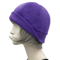 1930s Cloche Hat for Women modeled on a hat mannequin. Handmade in warm Fleece Hat. Purple with Large Flower Brooch, Satin Lined Winter Hat, Handmade in USA Boston Millinery. Plain Side view 