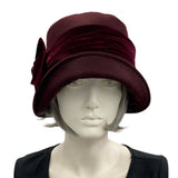 Cloche Hat the Eleanor narrow front brim dark burgundy eggplant wool with velvet band and square bow handmade by Boston Millinery  modeled on a hat stand front view 