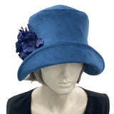 1920s Cloche Hat, Blue Velvet Hat with Hydrangea Flower Brooch, Handmade in the USA, Elegant Formal Headwearmodeled on hat mannequin, top front  view 