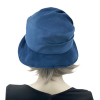 1920s Cloche Hat, Blue velvet with peony brooch modeled on a hat mannequin rear view 