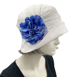1930s style Summer Cloche Hats, handmade in White Linen with Pretty Hydrangea Flower Brooch, Blue side view 