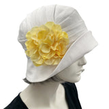 1930s style Summer Cloche Hats, handmade in White Linen with Pretty Hydrangea Flower Brooch, Yellow side view 