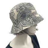 Rain Hat, Outdoor Hat, Cloche Hat Women in Gray and Cream Paisley Print . Side view of hat